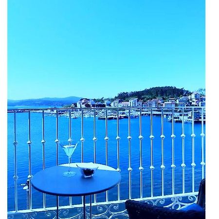 Hotel Puerto Arnela กามาริญาส ภายนอก รูปภาพ