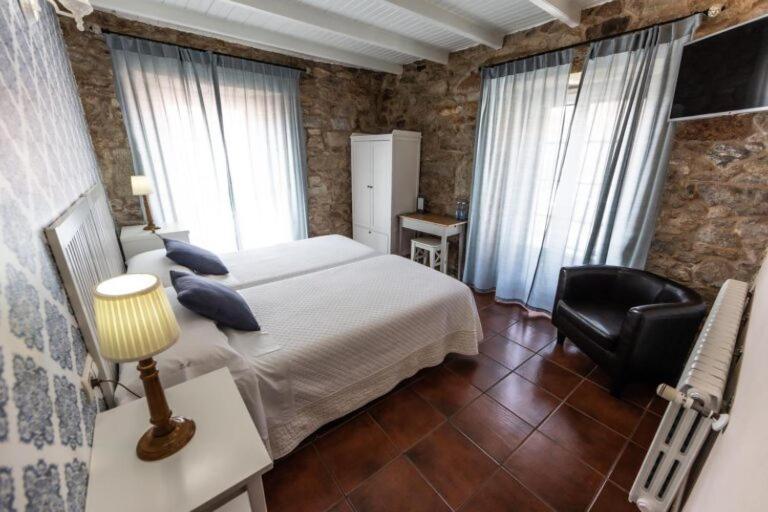 Hotel Puerto Arnela กามาริญาส ภายนอก รูปภาพ