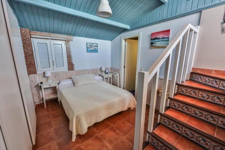 Hotel Puerto Arnela กามาริญาส ภายนอก รูปภาพ