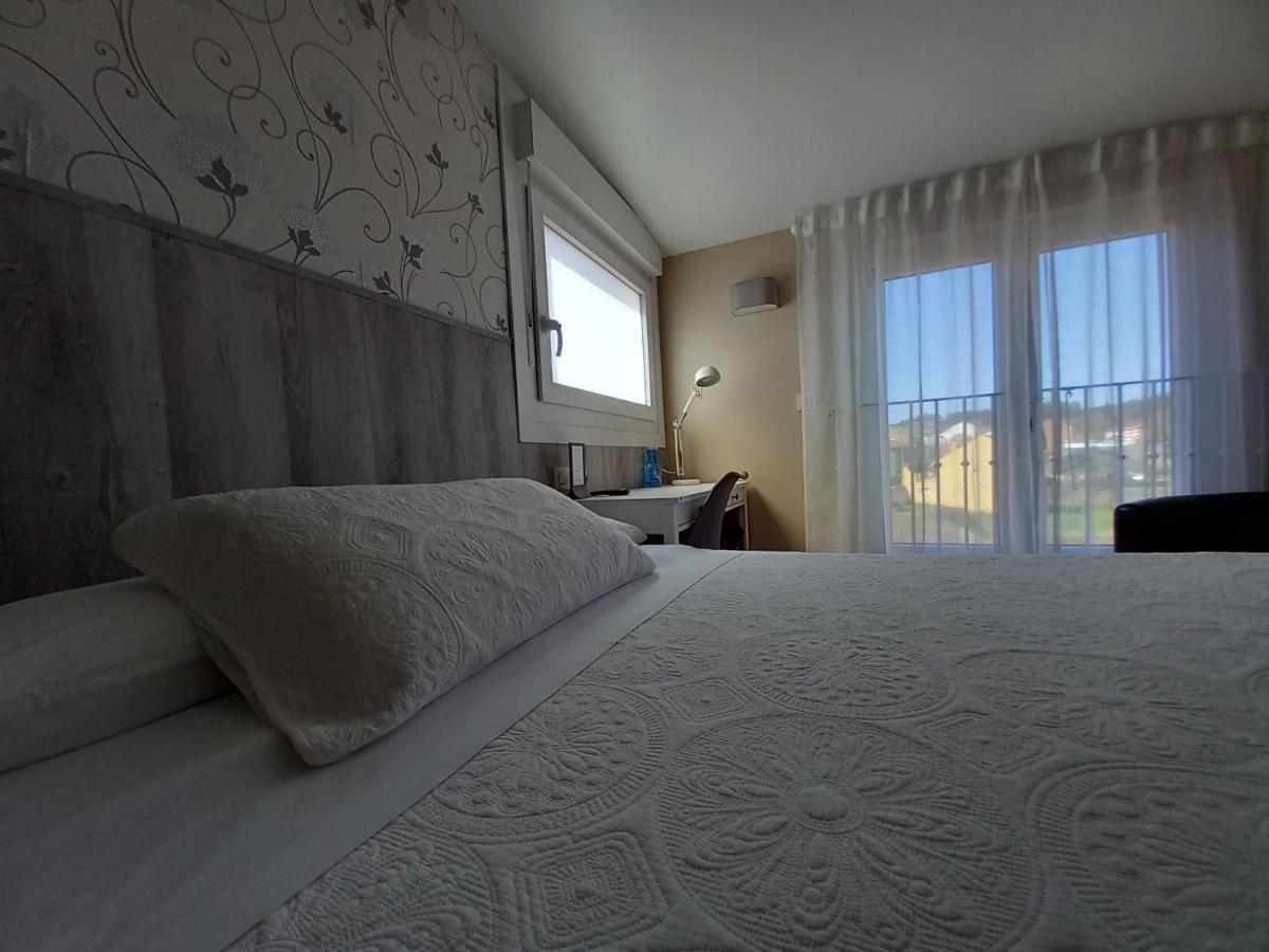 Hotel Puerto Arnela กามาริญาส ภายนอก รูปภาพ